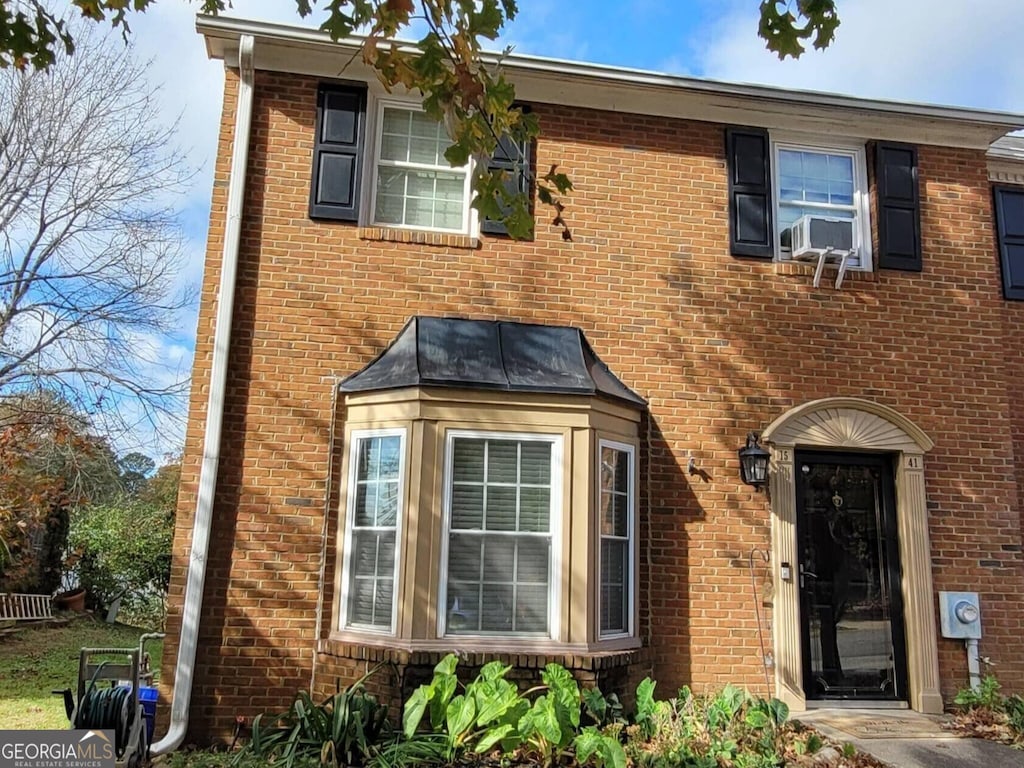 view of front of property featuring cooling unit