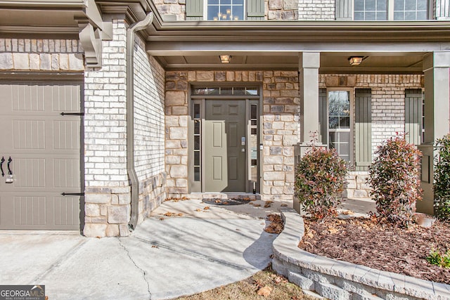 property entrance with a garage