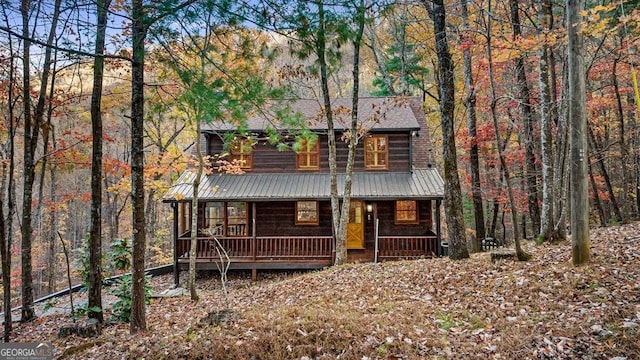 view of front of property featuring covered porch