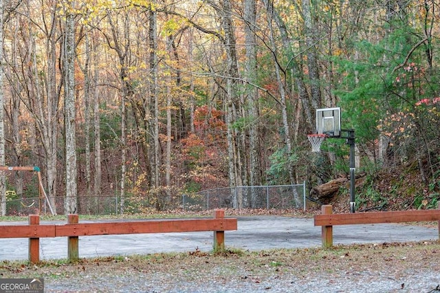 wooden deck with basketball court