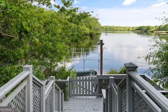 exterior space with a water view