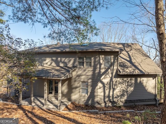 back of property with a patio area