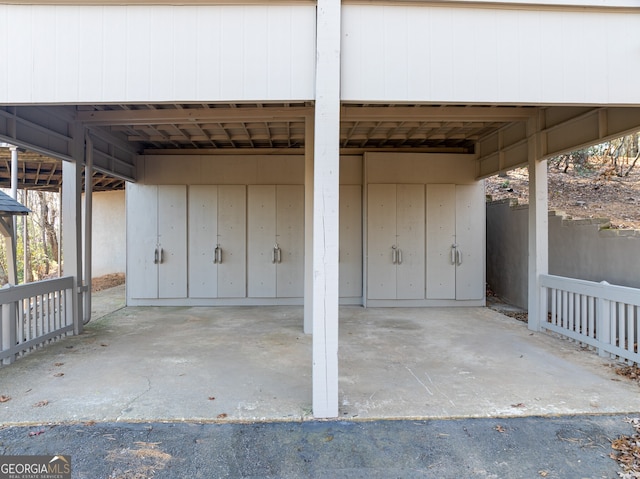 exterior space with a carport