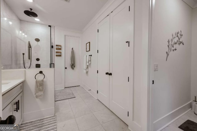 bathroom with vanity and tiled shower