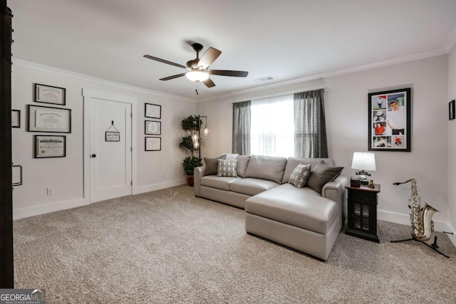 living room featuring carpet flooring, ceiling fan, and ornamental molding