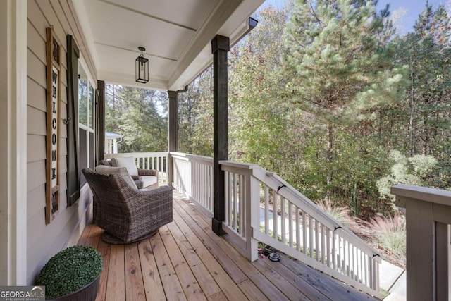 wooden terrace featuring a porch