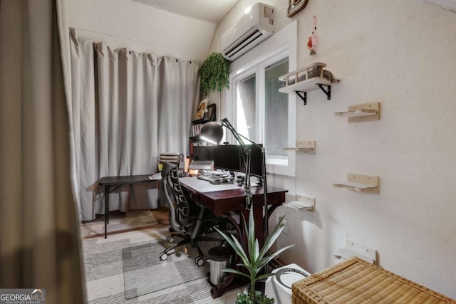 home office with lofted ceiling and a wall mounted air conditioner