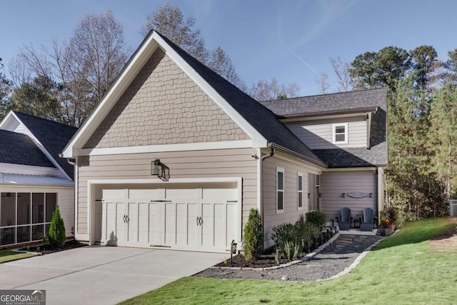 view of property exterior featuring a garage and a lawn