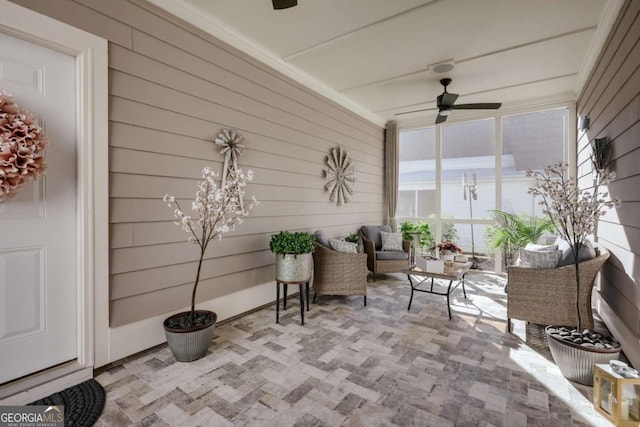 sunroom / solarium with ceiling fan