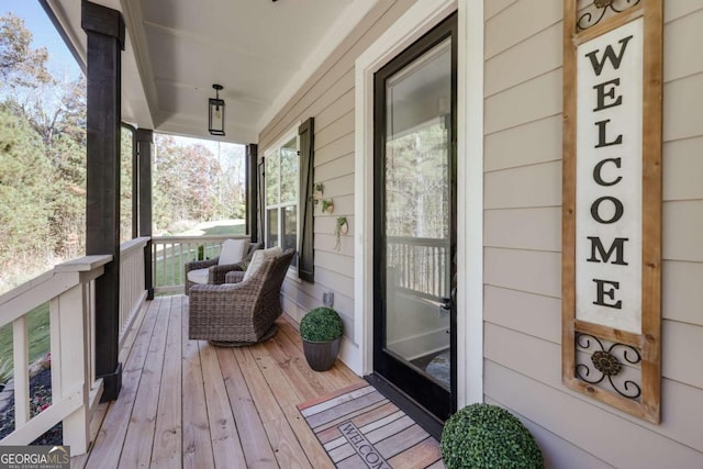 wooden terrace with covered porch