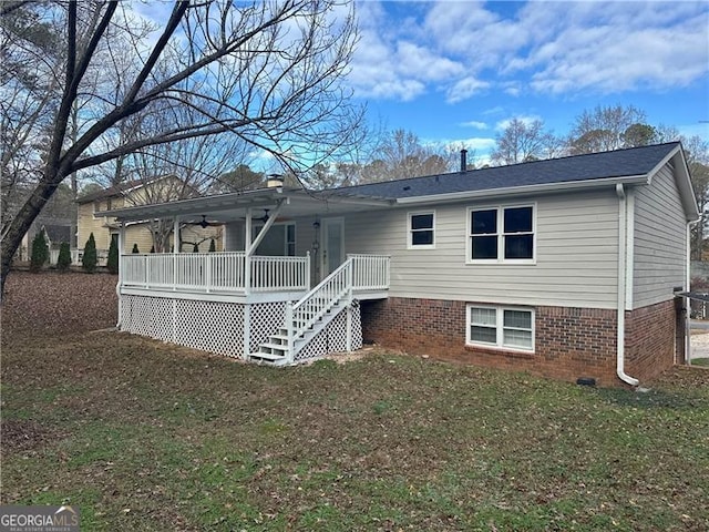 rear view of property with a lawn and covered porch