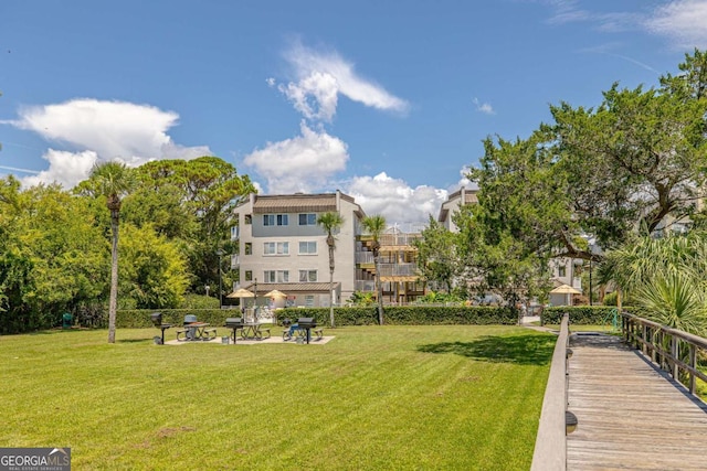 view of community with a lawn