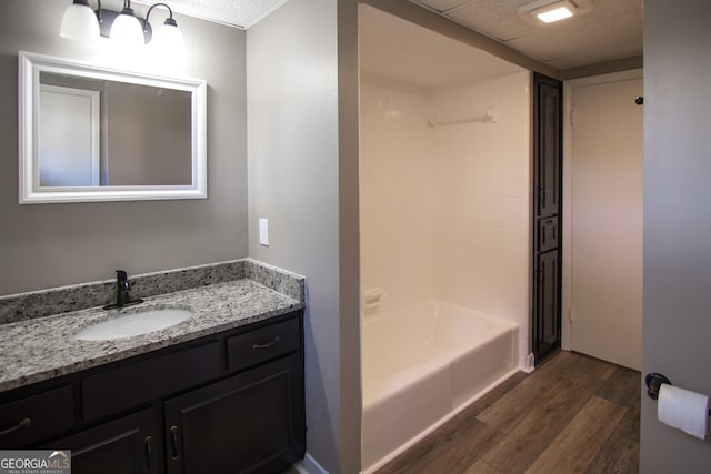 bathroom featuring vanity and wood-type flooring