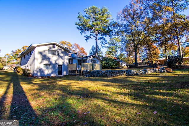 view of yard with a sunroom