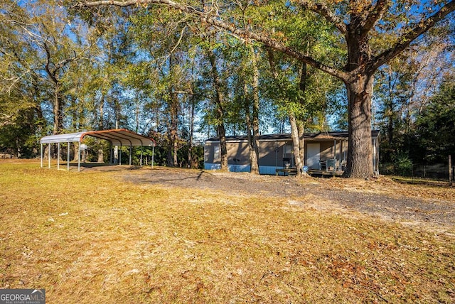 view of yard with a carport