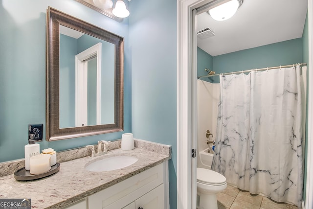 full bathroom with toilet, shower / tub combo, vanity, and tile patterned floors