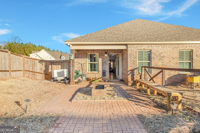 rear view of house with a patio area