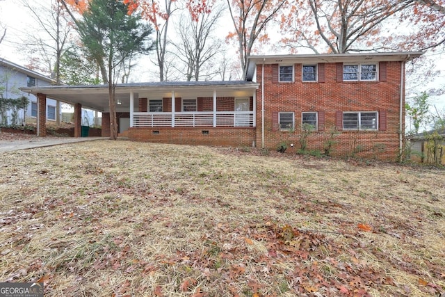 view of front of property featuring a carport