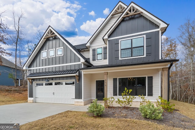 craftsman inspired home with a porch and a garage