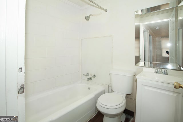 full bathroom featuring tiled shower / bath combo, toilet, and vanity