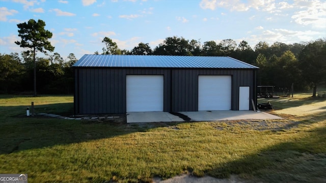 garage with a lawn