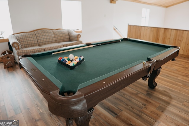 game room with hardwood / wood-style floors and pool table