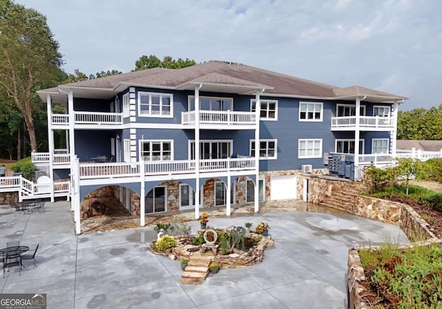 rear view of property with a patio area