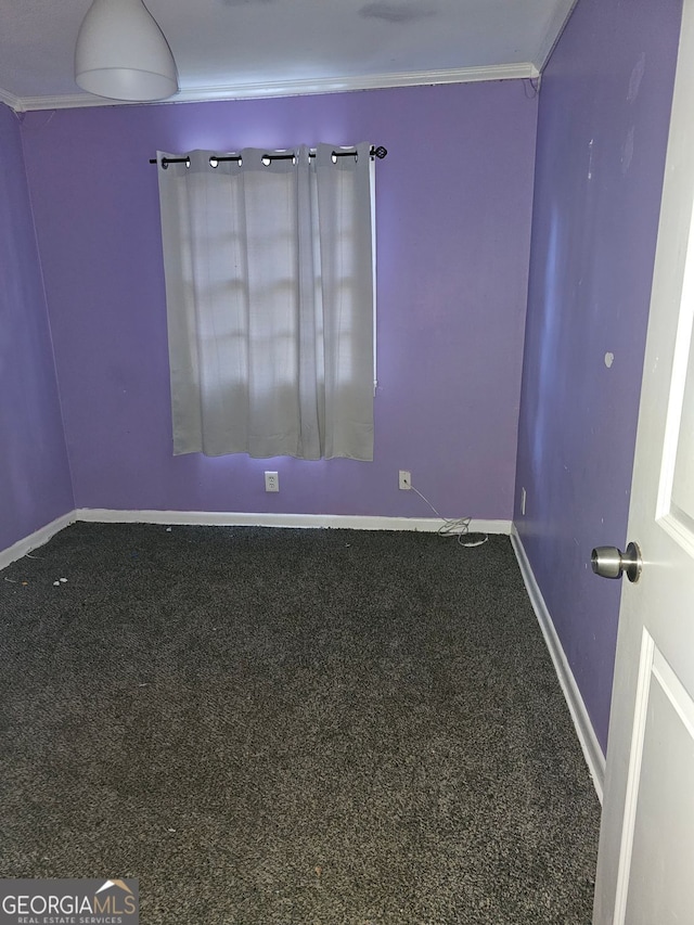 unfurnished room featuring ornamental molding