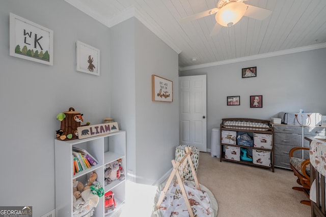 carpeted bedroom with ornamental molding, ceiling fan, and wooden ceiling