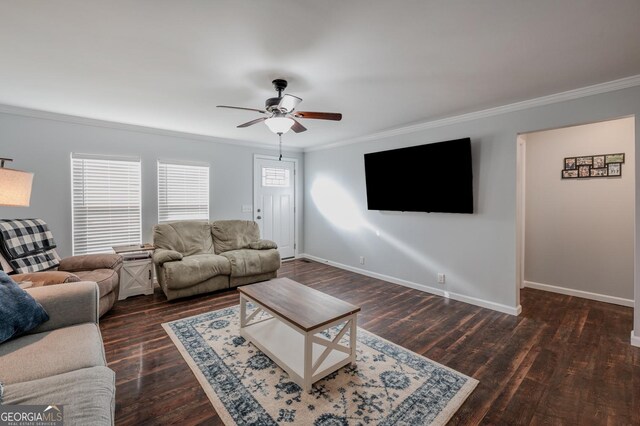 living room with crown molding, ceiling fan, and dark hardwood / wood-style floors