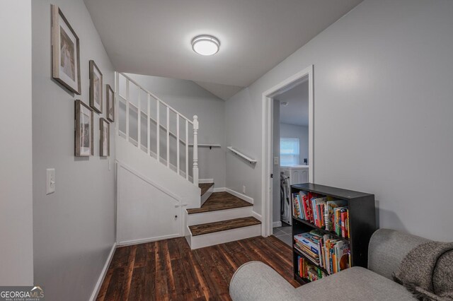 staircase with hardwood / wood-style flooring