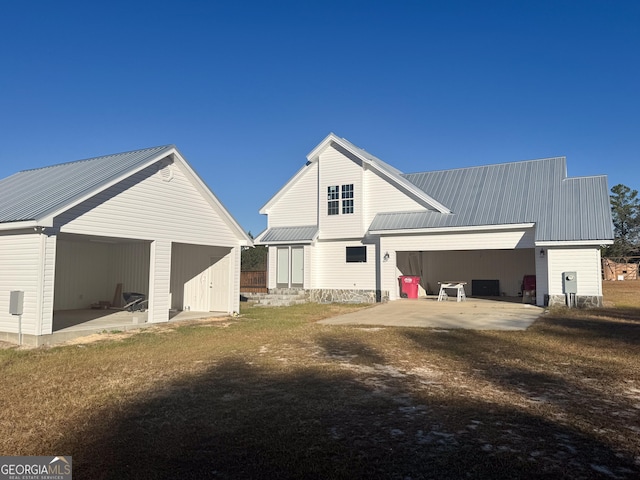429 Deens Landing Rd, Baxley, GA 31513 - back of property featuring metal roof