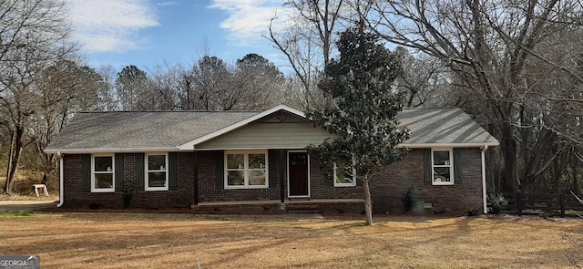 ranch-style home with a front yard