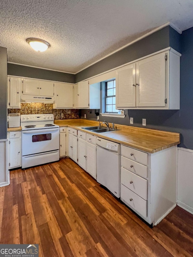 kitchen with white appliances, dark wood-type flooring, sink, a textured ceiling, and white cabinetry