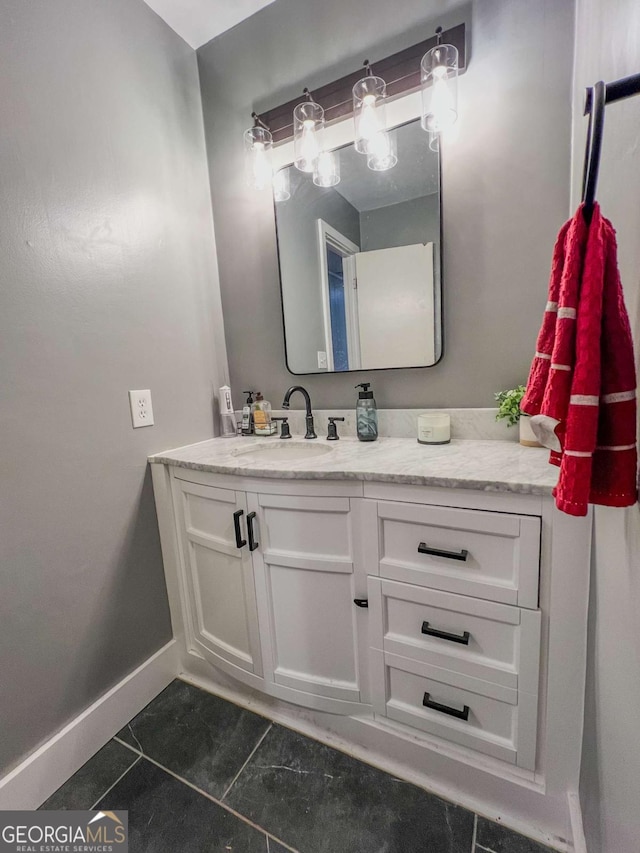 bathroom with vanity and tile patterned floors