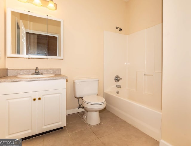 full bathroom with tile patterned floors, vanity, shower / tub combination, and toilet