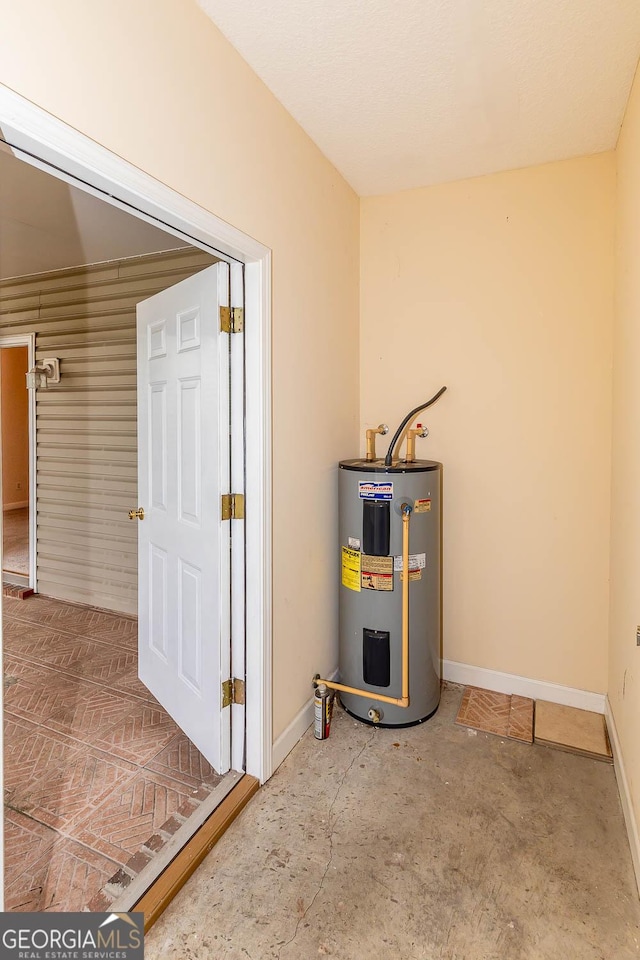 utility room featuring water heater