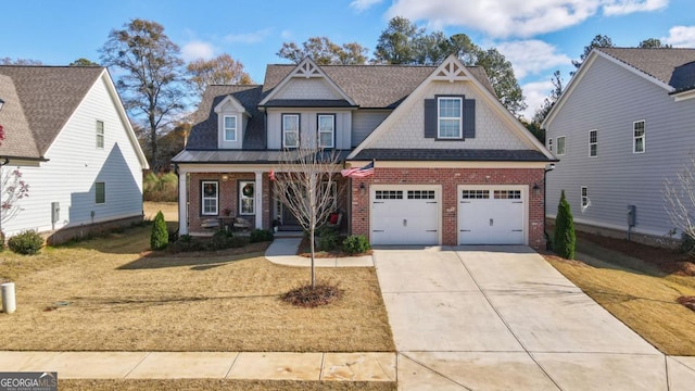 craftsman-style home featuring a garage, a porch, and a front lawn