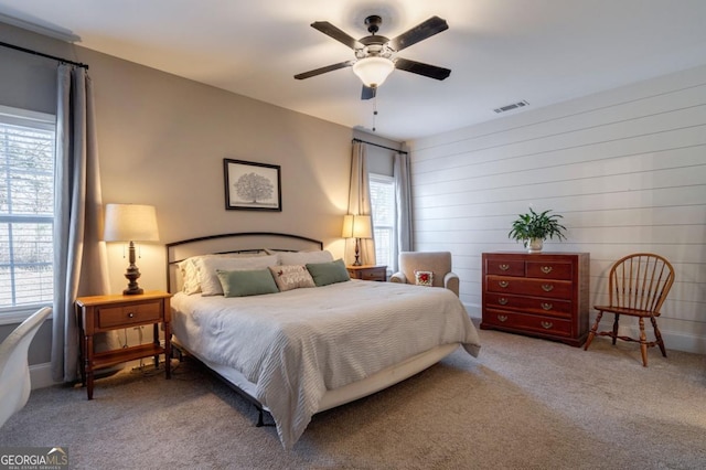 bedroom with ceiling fan and carpet flooring