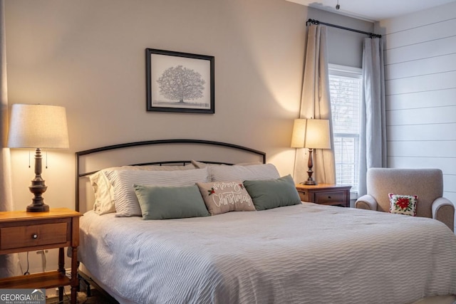 bedroom featuring multiple windows