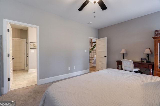 bedroom with light colored carpet and ceiling fan