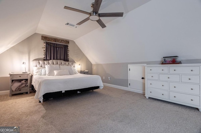 bedroom with lofted ceiling, light colored carpet, and ceiling fan