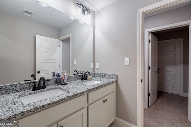 bathroom featuring vanity