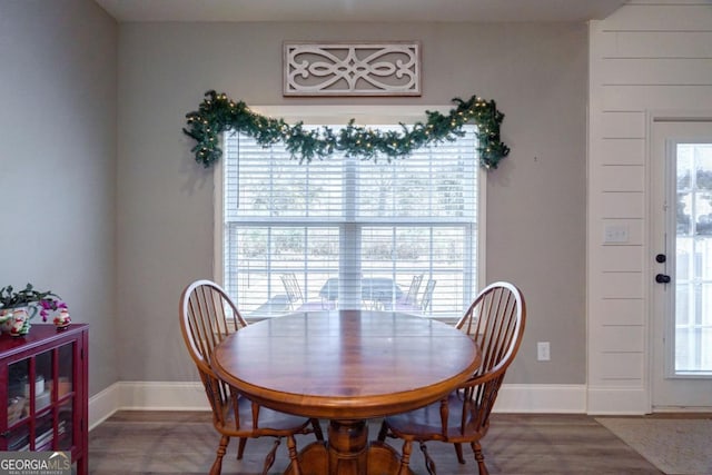 dining area featuring wood-type flooring