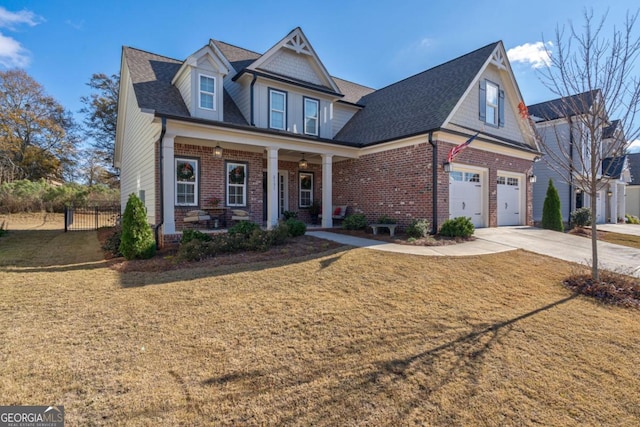 view of front of home with a garage and a front yard