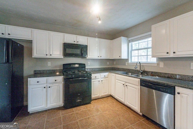 kitchen featuring sink, white cabinets, and black appliances