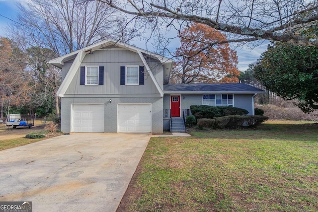 split level home featuring a garage and a front lawn