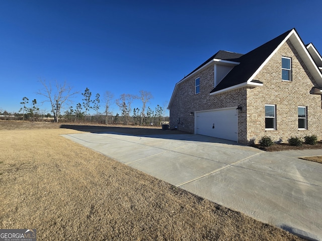 view of home's exterior featuring a garage