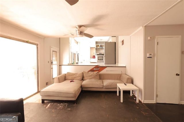 living room featuring ceiling fan