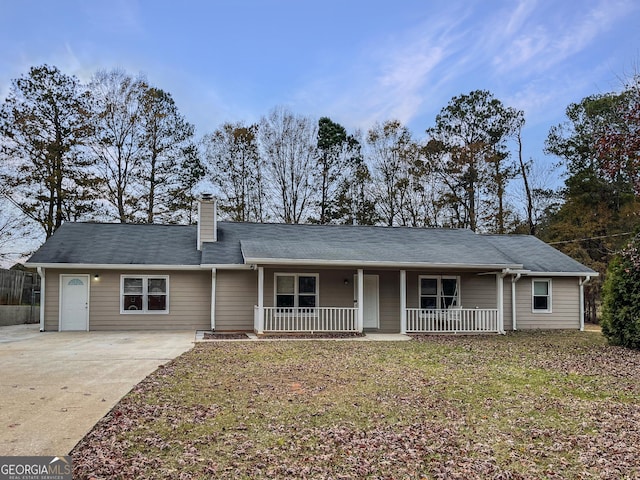 165 Riverbend Dr, Covington, GA 30014 - ranch-style house featuring a front yard
